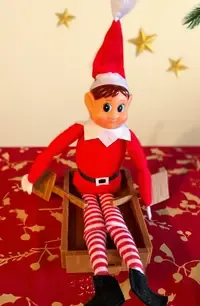 Rampenissen ror i Minecraft-båt.